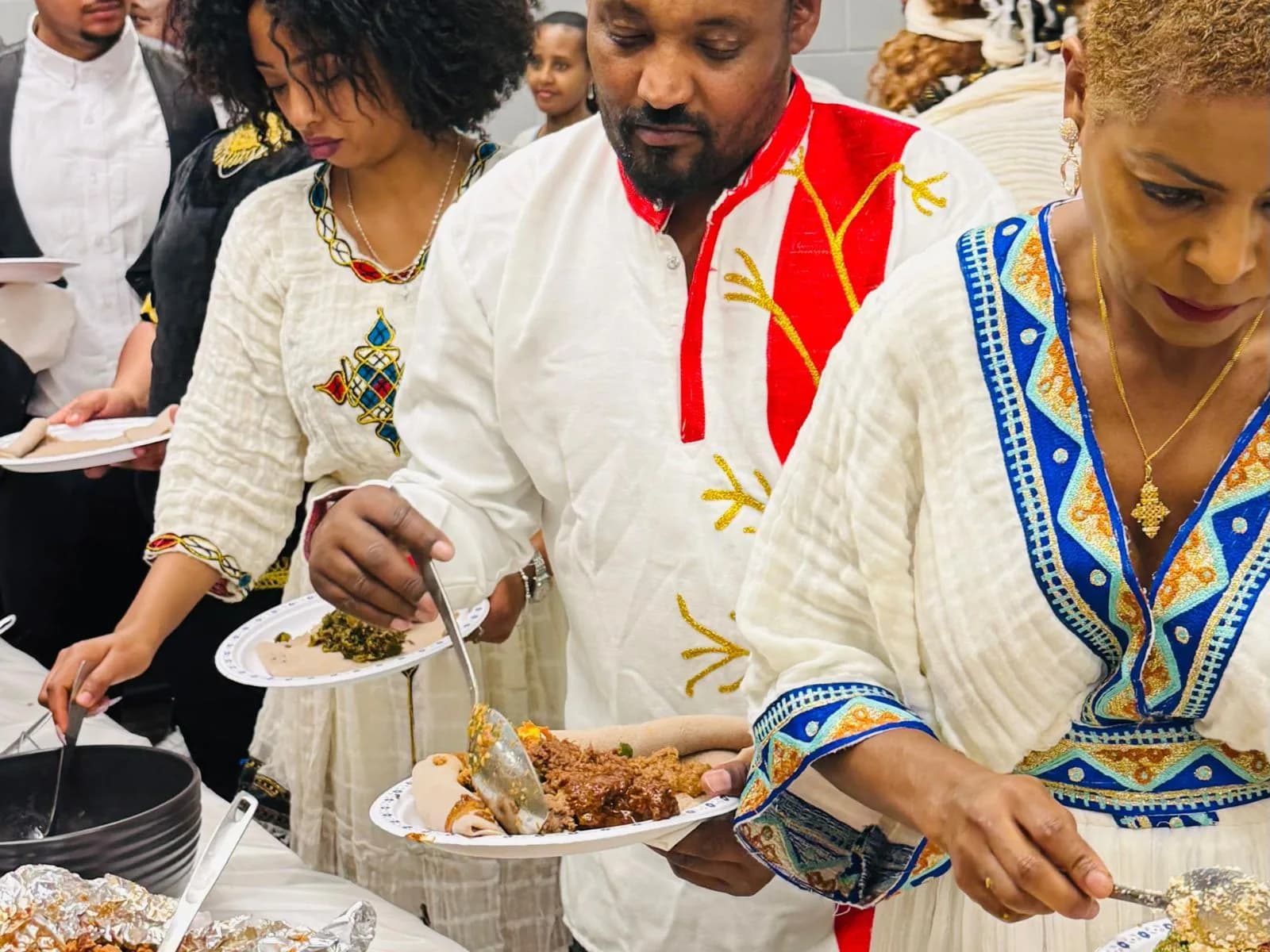 Community members sharing a meal at an Ebenezer Relief Society event