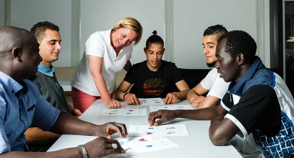 Newcomers practicing English and workplace skills together